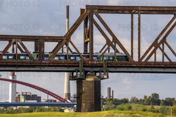 The railway bridge Duisburg-Hochfeld-Rheinhausen, over the Rhine, regional trains and many goods