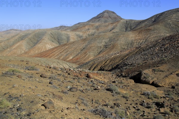 Bare moon-like arid landscape in mountains between Pajara and La Pared, Fuerteventura, Canary