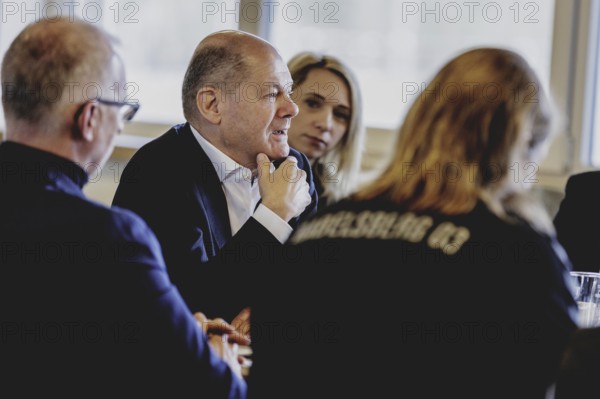 Olaf Scholz (SPD), Federal Chancellor, at a meeting with migrants and people involved in the field