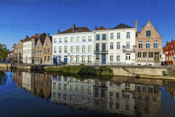 View of Bruges canal and old historic houses of medieval architecture. Brugge, Belgium, Europe