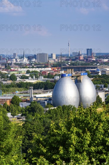 View of Dortmund city centre from the Deusenberg spoil tip, with the digestion towers of the Deusen