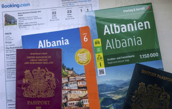 Guidebook map passports hotel booking for holiday tourist trip to Albania