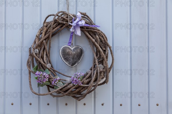 Door wreath with heart, Rhineland-Palatinate, Germany, Europe