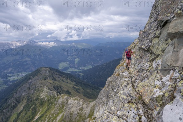 Hiker on the Carnic High Trail, ascent to the Raudenspitze, Carnic Main Ridge, Carnic Alps,