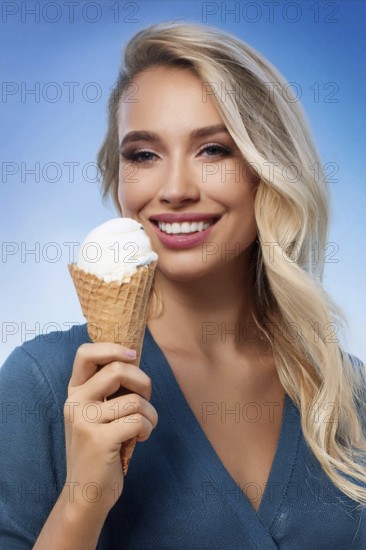 A blonde woman enjoys eating an ice cream in a cone