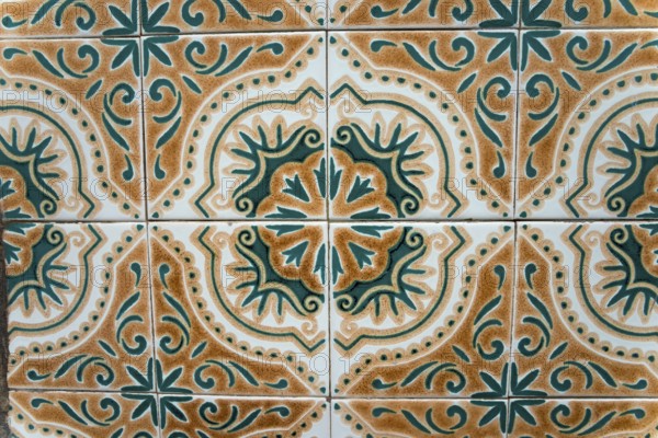 Detailed traditional tile pattern in shades of green and brown, azulejos, Portugal, Europe