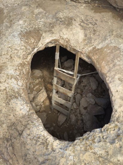 La Cova Foradada cave at the Far de Cap de Barbaria lighthouse on the southern tip of Formentera,