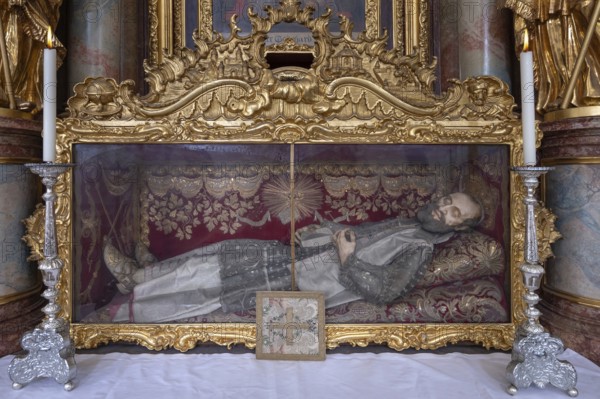 Magnificent glass shrine with a sculpture of a saint, Basilica of St Mauritius, Niederaltaich,