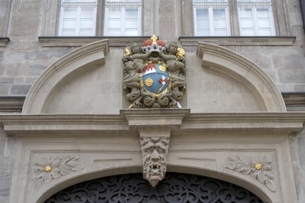 Coat of arms cartouche from 1693 above the portal of the Knauf Museum, market square, Iphofen,