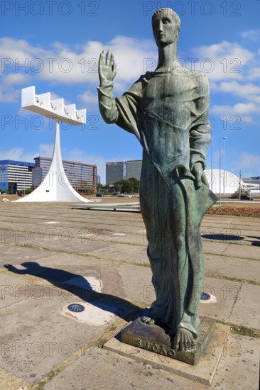 St John the Evangelist statue by Alfredo Ceschiatti and Dante Croce in front of the bell tower of