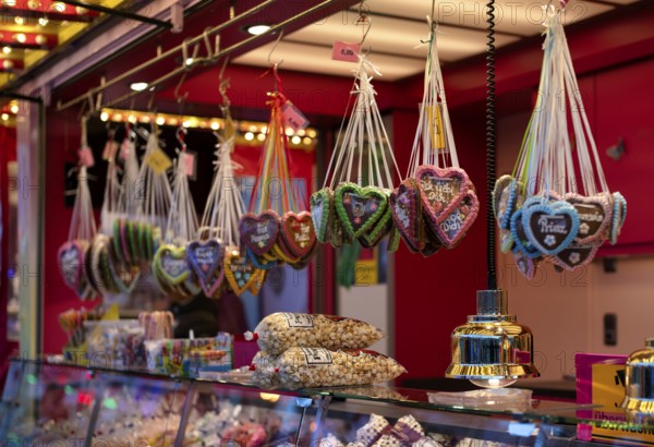 Sales stand with gingerbread hearts with inscription, I love you, popcorn, confectionery, sweets,