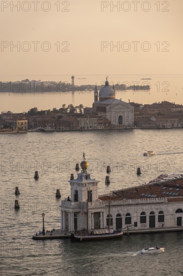 Punta della Dogana and church Chiesa del Santissimo Redentore on the island of Guidecca at sunset,