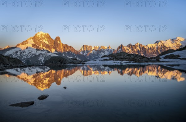 Evening mood, mountain landscape at sunset, alpenglow, water reflection in Lac Blanc, mountain