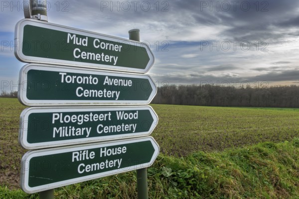 Signposts showing directions to different WW1 military cemeteries on former World War One