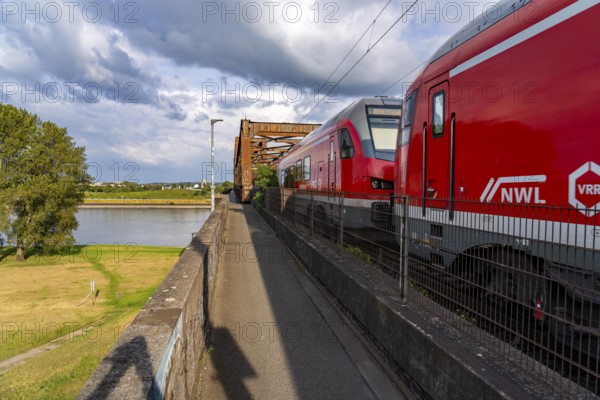 The railway bridge Duisburg-Hochfeld-Rheinhausen, over the Rhine, regional trains and many goods
