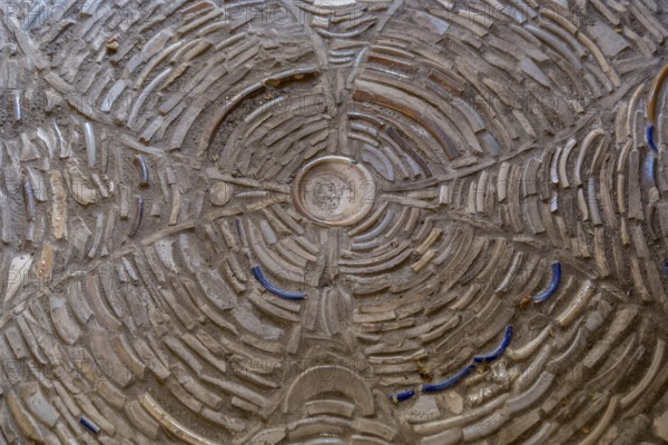 Floor made of skilfully laid clay shards in a historic farmhouse, North Rhine-Westphalia, Germany,