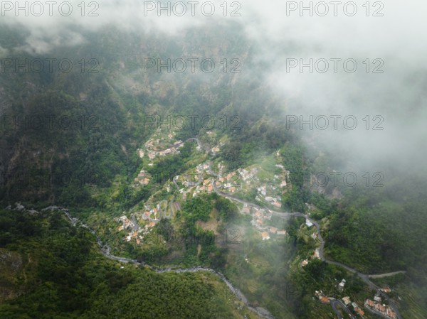 Aerial drone view of Curral das Freiras village in Valley of the Nuns from Miradouro da Eira do