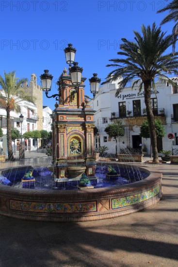 Fountain and palm trees in Plaza de Espana, Vejer de la Frontera, Cadiz Province, Spain, Europe