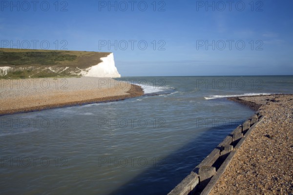 Chalk cliffs of the Seven Sisters from Cuckmere river mouth, East Sussex, England, United Kingdom,