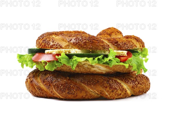 Traditional Turkish bagel simit, breakfast, on a white background, horizontal, no people