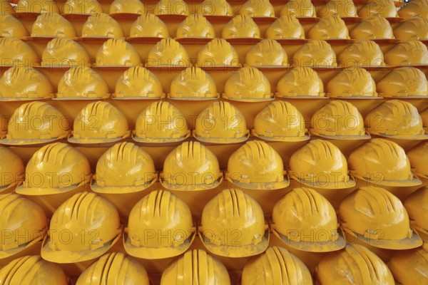 Pyramid with yellow safety helmets, ore hall UNESCO Völklingen Ironworks, working clothes, helmets,