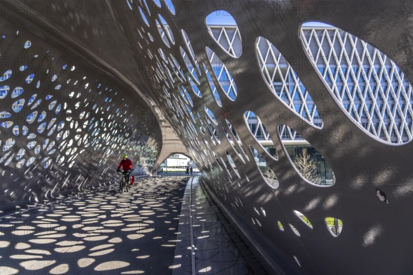Light effects from the sun in the Parkbruk, a cycle and pedestrian bridge in the city centre of