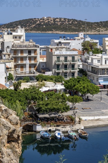The village of Agios Nikolaos, in the eastern part of Crete, view over Lake Voulismeni, connected