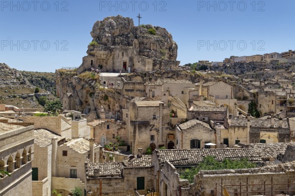 The rock church of Santa Maria dell'Idris towers over the Sasso Caveoso district in the cave town