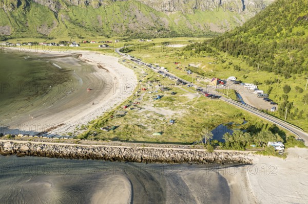 Aerial view of campsite at beach Ersfjordstranden, fjord Ersfjord, golden restroom, Senja island,