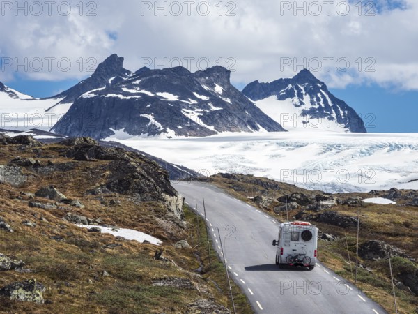 Camper van, mountain crossing Sognefjellsvegen, view towards glacier, mountain pass over the