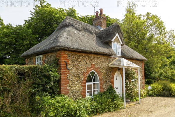 Small thatched cottage formerly Quilter estate property, Sutton, Suffolk, England, UK, Amy's