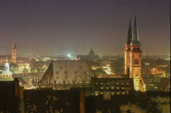 St Sebald's Church in Nuremberg, twin towers illuminated at night, Nuremberg, Bavaria, Germany,
