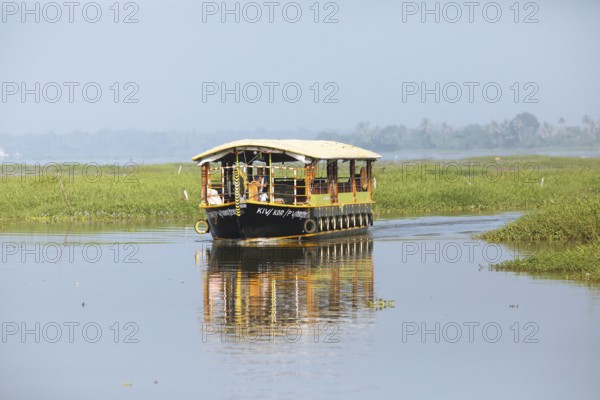 Traditional boat on Lake Vembanad, canal system of the backwaters, Kerala, India, Asia