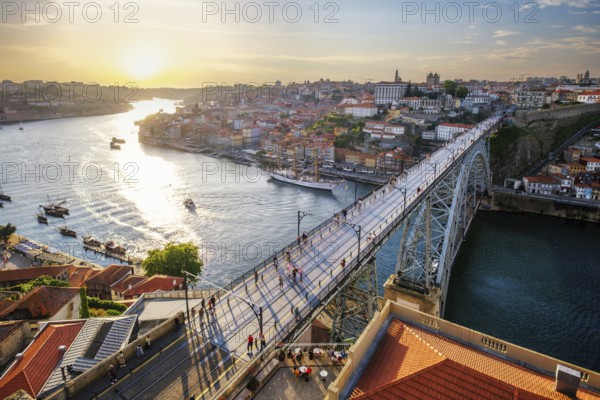 View of Porto city and Douro river and Dom Luis bridge I from famous tourist viewpoint Miradouro da