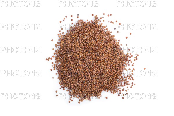 Pile of raw red quinoa isolated on white background. Top view, flat lay, close up, macro