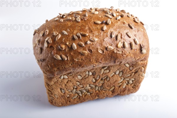 Rye bread with sunflower seeds isolated on white background. close up