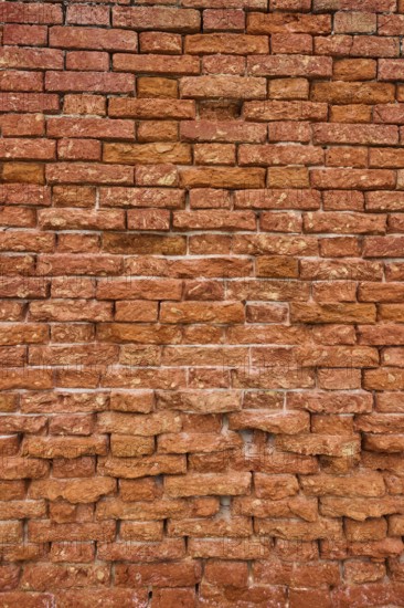 Detail of an old ziggurat wall made of bakestone bricks, Venice Italy