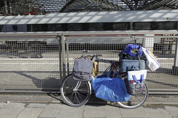 Fully loaded bicycle of a homeless man, Cologne, North Rhine-Westphalia, Germany, Europe