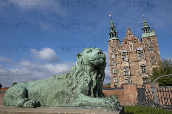 Bronze lion sculpture in front of Rosenborg Palace, 17th century royal palace and museum, Kongens