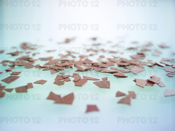 Chocolate chips as sprinkle decoration for decorating ice cream, cakes and muffins, studio photo