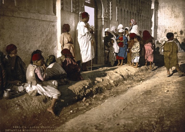 Beggar in front of the mosque Sidi Abderrhaman, Algiers, Algeria, ca 1890, Historical, digitally