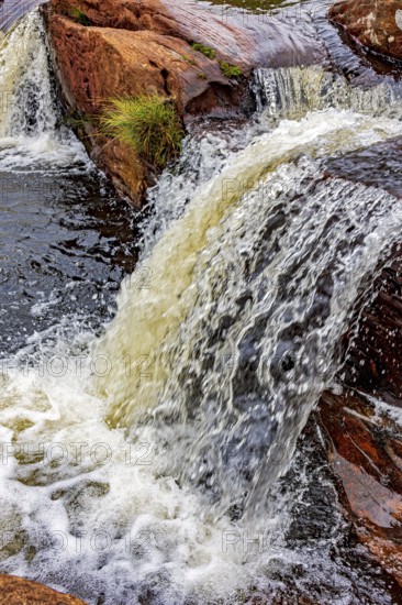 Small river and waterfall among the rocks of the Biribiri mountain range in Diamantina, Minas