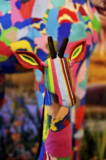 Animal figures made from washed-up sandals and flip-flops by African artists, Flora Maritime and