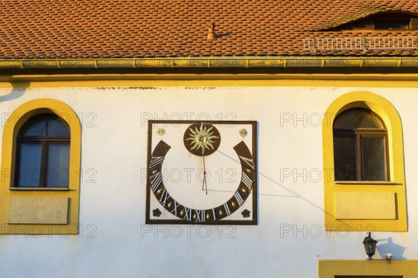 Sundial at the baroque castle Seußlitz in the evening light, Diesbar-Seußlitz, Saxon Elbland,