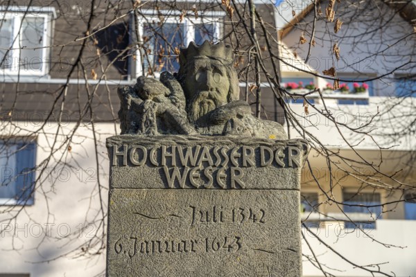 Column in memory of historic Weser floods in Hameln, Lower Saxony, Germany, Europe