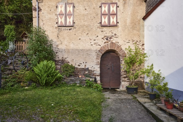Historic building, garden, shutters, door, Mesenich, district of Cochem-Zell, Rhineland-Palatinate,
