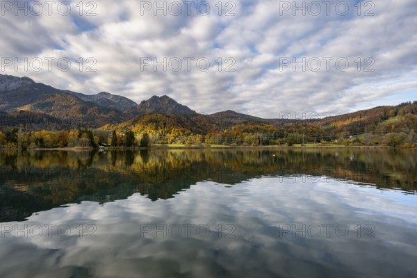 Autumn landscape by the lake, reflection in Lake Kochel, Upper Bavaria, Bavaria, Germany, Europe