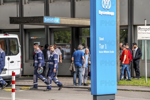 Steelworkers at a demonstration in front of the headquarters of ThyssenKrupp Steel Europe in