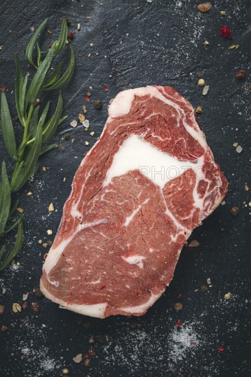 Fresh, raw rib eye steak, top view