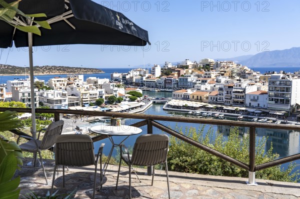 Taverna above the village of Agios Nikolaos, in the eastern part of Crete, view over Lake